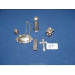A silver thimble and brooch front, two pretty white metal perfume bottles with dropper in the tops,