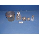 Five glass pots with silver lids and collars including William Adams 1942,