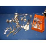 A quantity of epns cutlery including mother of pearl handled Oyster knives and forks,