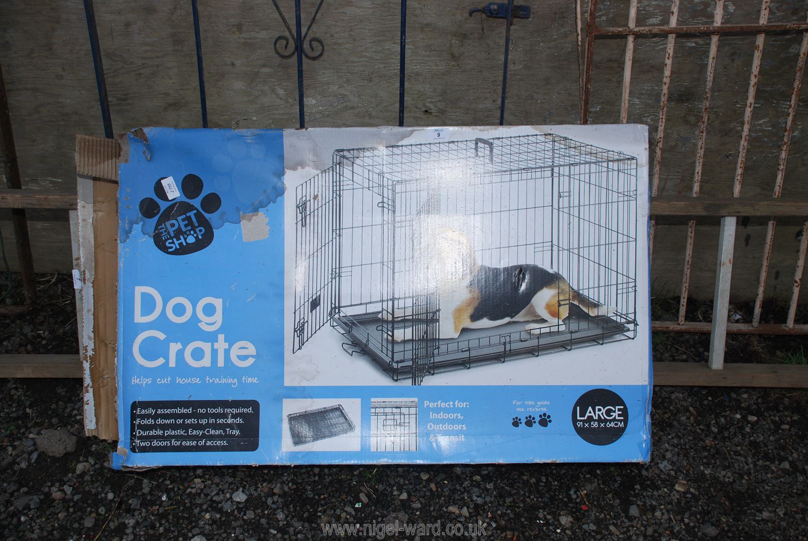 A large boxed dog crate.