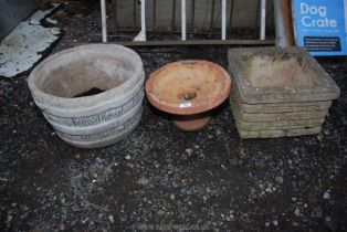 Two concrete planters and terracotta style bird bath.