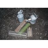 A quantity of chicken feeders, watering can, galvanised water carrier and wire.