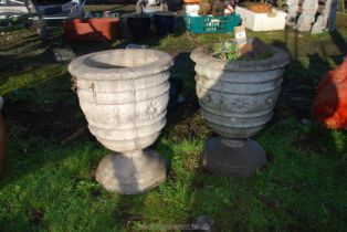 Pair of concrete urn style planters, 18'' high x 14'' diameter.
