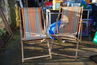 Pair of wood and canvas deck chairs