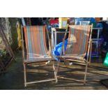 Pair of wood and canvas deck chairs