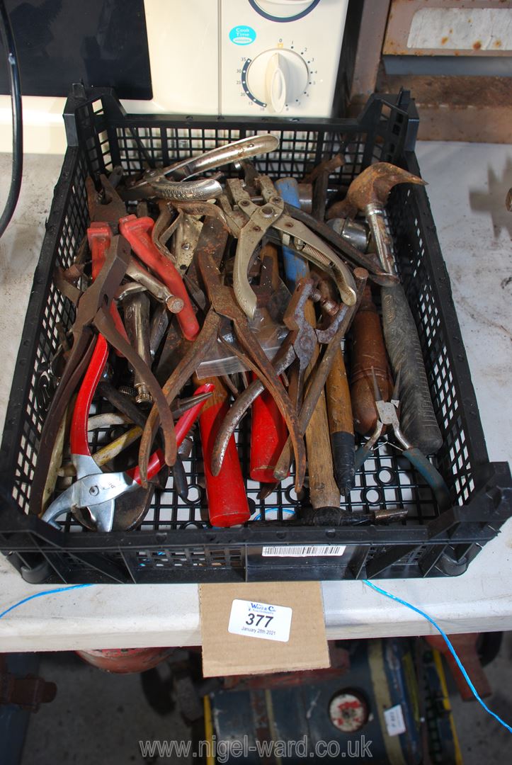 Tray of various hand tools: pliers, hammers, punches, etc.