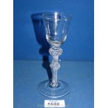 An early, possibly 18th century wine glass with air twist, 6 1/4" tall.