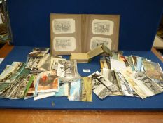 A quantity of Postcards including black & white and colour, an album of postcards from Mevagissey,