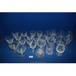 A quantity of etched and cut glass including brandy balloons,