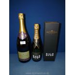 Two bottles of Champagne: Moet Chandon Grand Vintage, 750 ml and Cremant de Loire, 150 cl.