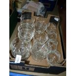 A quantity of etched glasses including set of five and set of six sundae dishes and four etched