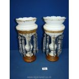 A pair of white Lustres, complete,