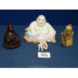 A small quantity of oriental style figures including red Buddha, porcelain, carved bone etc.