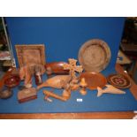 A quantity of Treen including horse head, eagles, carved boxes, crucifix, plates etc.