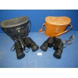 Two pairs of Binoculars: Focus Delux 10 x 50 and Boots Pacer 10 x 50, both cased.