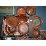 A quantity of Treen stands and bowls, marble inlaid platter from Grimsdale, etc.