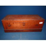 A wooden Travel box with brass swan neck drop handles to the sides, divided interior,