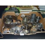 A quantity of plated and metal items including bud vases, candlestick, goblets etc.