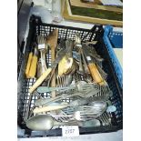 A quantity of bone handled knives, forks, spoons, teaspoons etc.