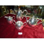 A Walker and Hall Sheffield Epns hot water jug, teapot, sugar bowl and milk jug.