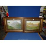 A pair of wooden framed and mounted Prints depicting Highland Cattle drinking from lochs with steep