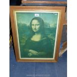 A wooden framed Print depicting The Mona Lisa, 20 1/4" x 26".