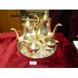 A five piece 'Grenadier' silver plated tea and coffee set, including hot water jug.