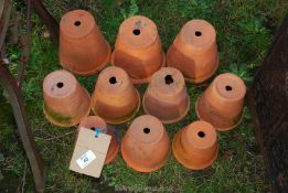 Ten various sized terracotta pots