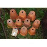 Ten various sized terracotta pots