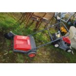 A Cleanfix hand operated sweeper