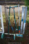 A lawn scarifier, fork, spade etc.