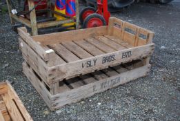 A pair of wooden vegetable crates,