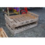 A pair of wooden vegetable crates,