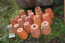 Nineteen various size terracotta pots