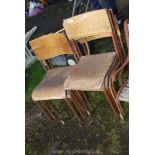 Seven stacking chairs