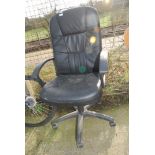 A faux leather office chair