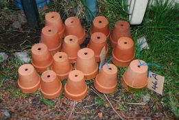 Sixteen terracotta plant pots