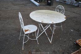 A metal patio table,