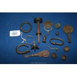 A small quantity of metal artifacts including a medieval horse hames ring, seal, button, etc.