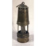 An early brass Miner's lamp, applied plaque marked 026.