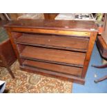 A good Walnut and Mahogany floor standing Bookshelves having ebony/darkwood stringing and inlay and