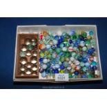 A quantity of old Marbles, 17 clear and over 160 coloured.