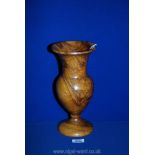 A treen baluster Vase with striking figured grain possibly walnut, 12" tall.