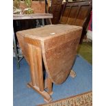 A heavy and stylish unvarnished /unpolished light Oak swing leg drop leaf Table,