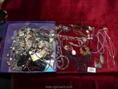A quantity of costume jewellery to include; earrings, pendants, bangle watch, etc.