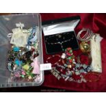 A quantity of costume jewellery to include; bangles, necklaces, bracelets of wooden beads, etc.