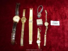 Several vintage wristwatches including; a gents Ingersoll with leather alligator Omega strap.