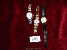 Two ladies Seiko solar wristwatches and a Pulsar water resistant watch.