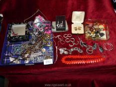 A quantity of costume jewellery to include; cufflinks, scarf clip, earrings, pendants, etc.