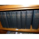 Eight Volumes of The Encyclopedia Britannica, Eleventh Edition.